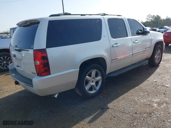 2011 Chevrolet Suburban LTZ with VIN 1GNSCKE02BR317269, listed as a IAAI auction lot 41446893 with 304,318 mi miles. Bid and sale history available at carsss.com. Image 4.
