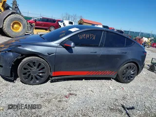 2021 Tesla Model Y Performance with VIN 5YJYGDEF1MF268405, listed as a IAAI auction lot 41818331 with 43,621 mi miles and . Bid and sale history available at DreamBid. Image 14.