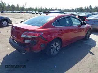 2009 Mazda 6 i Grand Touring with VIN 1YVHP82A495M04111, listed as a IAAI auction lot 42031522 with 251,839 mi miles. Bid and sale history available at carsss.com. Image 4.
