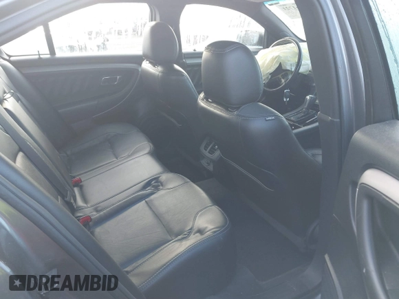 2013 Ford Taurus SEL z VIN 1FAHP2E84DG193376, wystawiony jako IAAI lot #41661721 z przebiegiem 136 341 mil mil oraz . Historia ofert i sprzedaży dostępna na DreamBid. Obrazek 8.