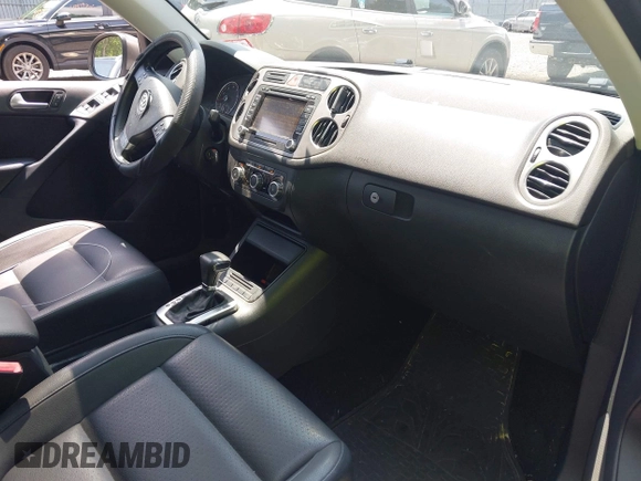 2010 Volkswagen Tiguan S with VIN WVGBV7AX1AW532415, listed as a IAAI auction lot 42561683 with 106,147 mi miles and . Bid and sale history available at DreamBid. Image 5.