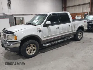 2002 Ford F-150 XLT with VIN 1FTRW08L02KE16948, listed as a IAAI auction lot 41881612 with 168,471 mi miles. Bid and sale history available at carsss.com. Image 2.