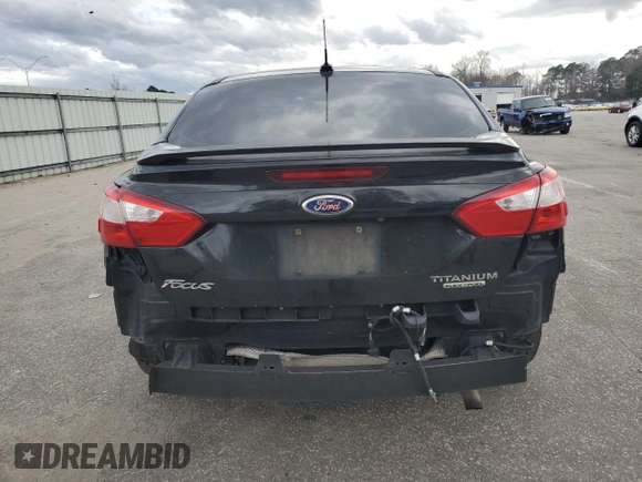 2014 Ford Focus Titanium with VIN 1FADP3J22EL221898, listed as a Copart auction lot 47867325 with 97,806 mi miles and Salvage Title. Bid and sale history available at DreamBid. Image 6.