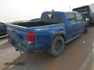 2018 Toyota Tacoma SR with VIN 3TMCZ5AN1JM124111, listed as a IAAI auction lot 41741973 with 90,175 mi miles. Bid and sale history available at carsss.com. Image 4.
