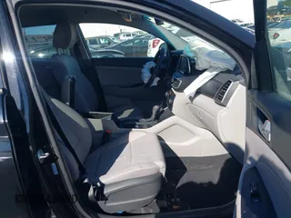 2021 Hyundai Tucson SE with VIN KM8J23A40MU334847, listed as a IAAI auction lot 41817556 with 63,000 mi miles and . Bid and sale history available at DreamBid. Image 5.