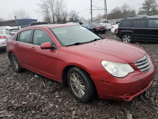 2009 Chrysler Sebring Touring *Ltd Avail* with VIN 1C3LC56B59N537686, listed as a Copart auction lot 84231154 with 144,333 mi miles and Salvage Title. Bid and sale history available at carsss.com. Image 4.