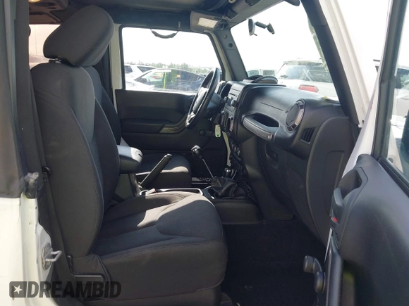2015 Jeep Wrangler Willys Wheeler with VIN 1C4AJWAG0FL562536, listed as a IAAI auction lot 42384747 with 103,507 mi miles and . Bid and sale history available at DreamBid. Image 5.