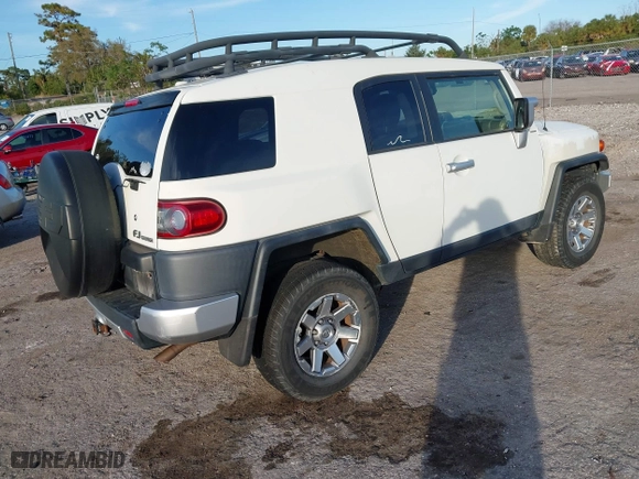 2014 Toyota FJ Cruiser with VIN JTEBU4BF1EK183485, listed as a IAAI auction lot 41185853 with 91,293 mi miles. Bid and sale history available at carsss.com. Image 4.