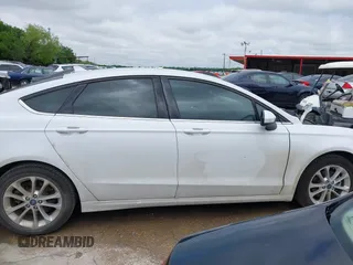 2020 Ford Fusion SE with VIN 3FA6P0H76LR154018, listed as a IAAI auction lot 42175889 with 65,187 mi miles and . Bid and sale history available at DreamBid. Image 14.