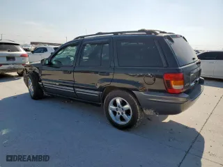2004 Jeep Grand Cherokee Laredo with VIN 1J4GX48S24C303786, listed as a Copart auction lot 53482155 with 167,823 mi miles and Salvage Title. Bid and sale history available at carsss.com. Image 2.