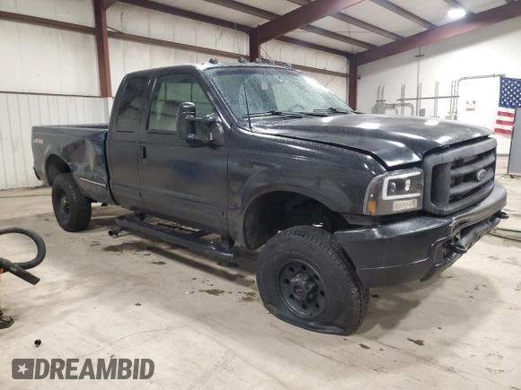 1999 Ford F-350 XL with VIN 1FTSX31S9XEA95645, listed as a Copart auction lot 43423285 with 169,449 mi miles and Salvage Title. Bid and sale history available at DreamBid. Image 4.
