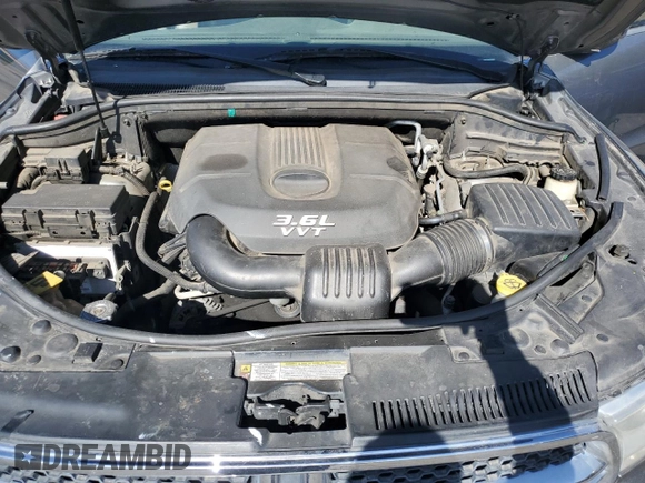 2013 Dodge Durango Crew with VIN 1C4RDJDG7DC554102, listed as a Copart auction lot 54045335 with 228,176 mi miles and Salvage Title. Bid and sale history available at DreamBid. Image 12.