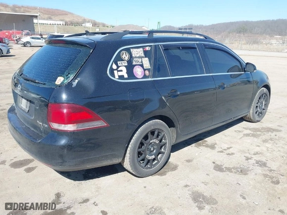 2012 Volkswagen Jetta SportWagen TDI with VIN 3VWML7AJ5CM673356, listed as a IAAI auction lot 41655411 with 191,792 mi miles. Bid and sale history available at carsss.com. Image 4.