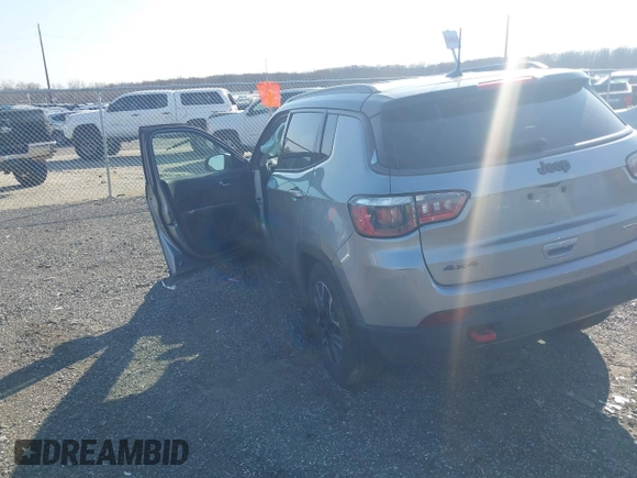 2020 Jeep Compass Trailhawk with VIN 3C4NJDDBXLT106663, listed as a IAAI auction lot 41791300 with 74,162 mi miles and . Bid and sale history available at carsss.com. Image 3.