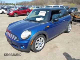 2008 MINI Hardtop with VIN WMWMF33528TT61214, listed as a IAAI auction lot 42054321 with 126,006 mi miles and . Bid and sale history available at DreamBid. Image 2.