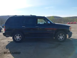 2005 GMC Yukon Denali z VIN 1GKEK63U55J254214, wystawiony jako IAAI lot #42103378 z przebiegiem 131 183 mil mil oraz . Historia ofert i sprzedaży dostępna na DreamBid. Obrazek 12.