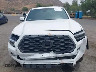 2023 Toyota Tacoma SR with VIN 3TMCZ5AN1PM556299, listed as a IAAI auction lot 42344160 with 42,338 mi miles and . Bid and sale history available at DreamBid. Image 13.