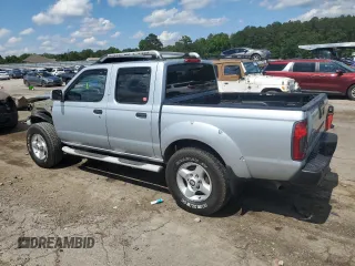 2001 Nissan Frontier SE with VIN 1N6ED27T51C311894, listed as a Copart auction lot 56281465 with 151,361 mi miles and Salvage title. Bid and sale history available at DreamBid. Image 2.