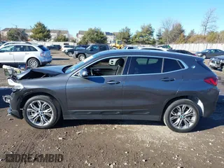 2022 BMW X2 xDrive28i with VIN WBXYJ1C05N5U40472, listed as a IAAI auction lot 41433452 with 67,801 mi miles. Bid and sale history available at carsss.com. Image 13.