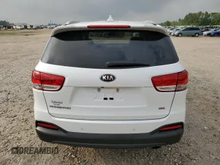 2018 Kia Sorento L z VIN 5XYPG4A35JG342050, wystawiony jako Copart lot #54517715 z przebiegiem 121 415 mil mil oraz Szkoda całkowita • Salvage title. Historia ofert i sprzedaży dostępna na DreamBid. Obrazek 6.