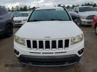 2011 Jeep Compass with VIN 1J4NT1FB8BD138161, listed as a Copart auction lot 73679894 with 199,735 mi miles and Salvage Title. Bid and sale history available at carsss.com. Image 5.