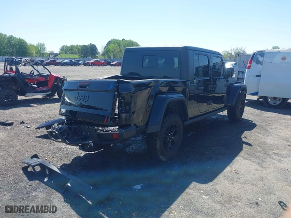 2023 Jeep Gladiator Freedom with VIN 1C6HJTAG1PL526229, listed as a IAAI auction lot 41972084 with 26,021 mi miles. Bid and sale history available at carsss.com. Image 4.