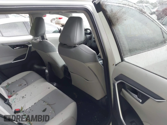 2022 Toyota RAV4 XLE Premium z VIN 2T3A1RFV1NW312419, wystawiony jako IAAI lot #42361686 z przebiegiem 14 291 mil mil oraz . Historia ofert i sprzedaży dostępna na DreamBid. Obrazek 8.