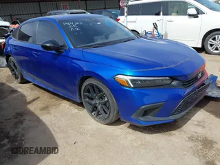 2023 Honda Civic Sport z VIN 2HGFE2F59PH557894, wystawiony jako IAAI lot #41859729 z przebiegiem 26 055 mil mil oraz . Historia ofert i sprzedaży dostępna na DreamBid. Obrazek 1.