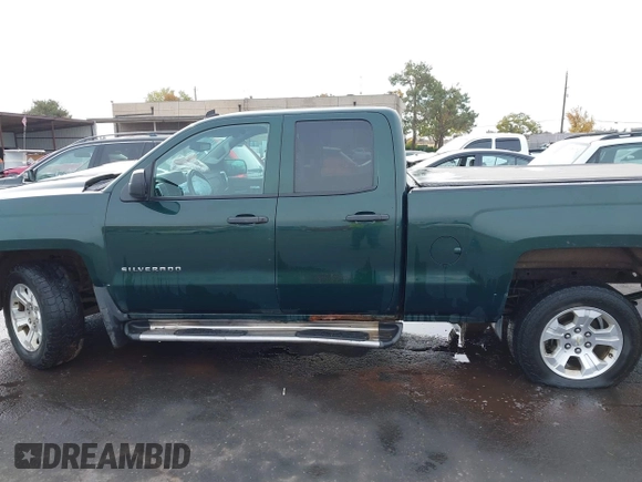2014 Chevrolet Silverado 1500 LT with VIN 1GCVKREC7EZ312679, listed as a IAAI auction lot 40874395 with 153,234 mi miles and . Bid and sale history available at DreamBid. Image 14.