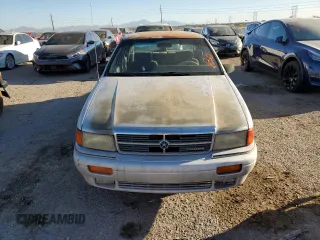 1991 Dodge Spirit z VIN 1B3XA5639MF549470, wystawiony jako Copart lot #76051284 z przebiegiem 62 309 mil mil oraz Szkody całkowita. Historia ofert i sprzedaży dostępna na DreamBid. Obrazek 5.