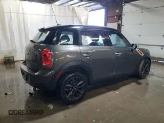 2014 MINI Countryman with VIN WMWZB3C59EWR42124, listed as a Copart auction lot 57830395 with 125,000 mi miles and Salvage title. Bid and sale history available at DreamBid. Image 3.