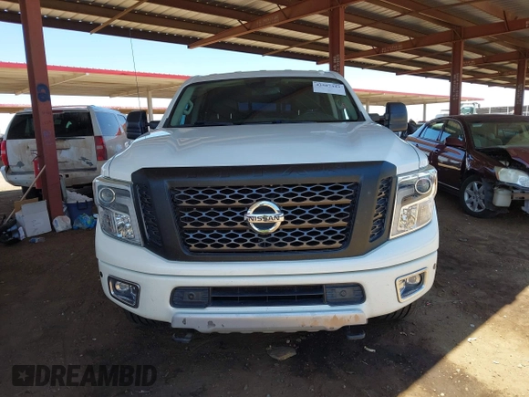 2019 Nissan Titan Pro-4X with VIN 1N6BA1F45KN533051, listed as a IAAI auction lot 42587343 with 134,768 mi miles and . Bid and sale history available at DreamBid. Image 12.