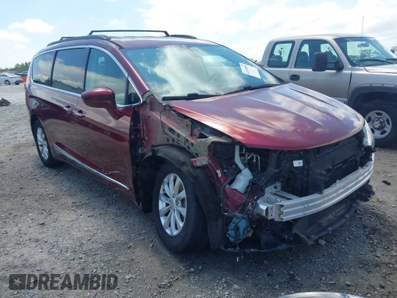 2017 Chrysler Pacifica Touring L with VIN 2C4RC1BG0HR591124, listed as a IAAI auction lot 42138595 with 113,071 mi miles and . Bid and sale history available at DreamBid. Image 1.