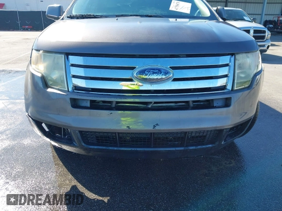 2010 Ford Edge SEL with VIN 2FMDK3JCXABA50115, listed as a IAAI auction lot 41758678 with 207,033 mi miles. Bid and sale history available at carsss.com. Image 13.