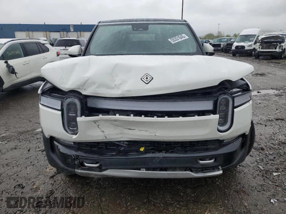 2023 Rivian R1S Adventure z VIN 7PDSGBBA2PN026420, wystawiony jako Copart lot #55331045 z przebiegiem 29 938 mil mil oraz Szkoda całkowita • Salvage title. Historia ofert i sprzedaży dostępna na DreamBid. Obrazek 5.