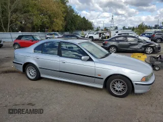 2000 BMW 5 Series 528iA with VIN WBADM6346YGU10549, listed as a Copart auction lot 75047164 with 324,945 mi miles and Salvage Title. Bid and sale history available at carsss.com. Image 4.