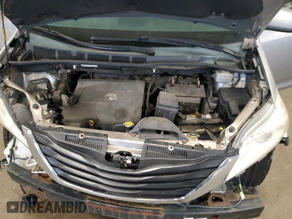 2012 Toyota Sienna XLE with VIN 5TDDK3DC2CS031088, listed as a Copart auction lot 60642845 with 186,586 mi miles and Salvage title. Bid and sale history available at DreamBid. Image 12.