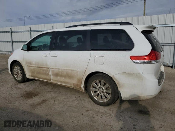 2014 Toyota Sienna Ltd with VIN 5TDDK3DC2ES073974, listed as a Copart auction lot 53738385 with 156,738 mi miles and Clean Title. Bid and sale history available at carsss.com. Image 2.