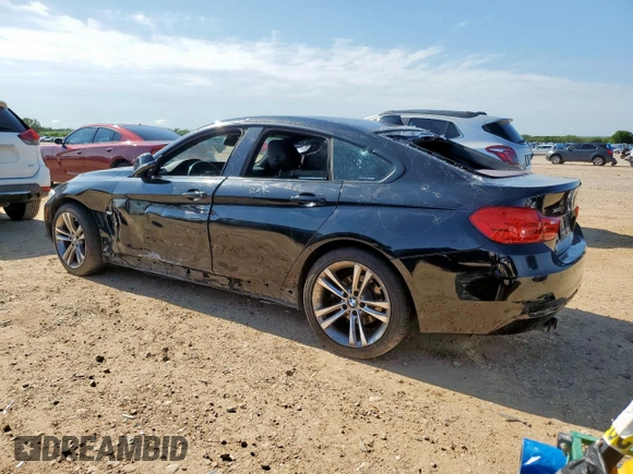2015 BMW 4 Series 428i xDrive with VIN WBA4C9C58FG135373, listed as a Copart auction lot 58545155 with 122,732 mi miles and Salvage title. Bid and sale history available at DreamBid. Image 2.