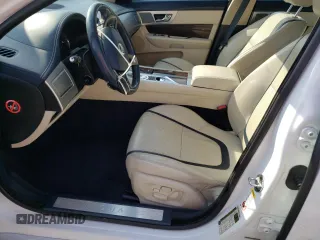 2012 Jaguar XF Portfolio with VIN SAJWA0HB4CLS36605, listed as a Copart auction lot 47179245 with 115,611 mi miles and Salvage Title. Bid and sale history available at carsss.com. Image 7.