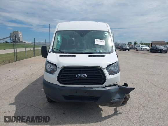 2019 Ford Transit z VIN 1FTYE2CM2KKB42436, wystawiony jako IAAI lot #42636612 z przebiegiem 51 860 mil mil oraz . Historia ofert i sprzedaży dostępna na DreamBid. Obrazek 13.
