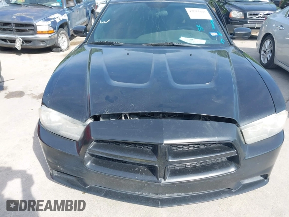 2014 Dodge Charger SE with VIN 2C3CDXBG9EH329419, listed as a IAAI auction lot 42025607 with 166,875 mi miles. Bid and sale history available at carsss.com. Image 6.