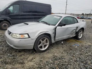 2003 Ford Mustang GT Deluxe with VIN 1FAFP42X33F380899, listed as a Copart auction lot 42158555 with 142,086 mi miles and Salvage Title. Bid and sale history available at carsss.com. Image 1.