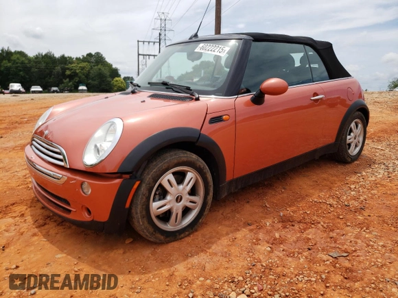 2006 MINI Convertible with VIN WMWRF335X6TF64910, listed as a Copart auction lot 60222215 with 85,761 mi miles and Salvage title. Bid and sale history available at DreamBid. Image 1.