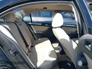 2012 Volkswagen Jetta TDI w/Premium with VIN 3VWLL7AJ3CM469621, listed as a IAAI auction lot 41831230 with 198,871 mi miles and . Bid and sale history available at DreamBid. Image 8.