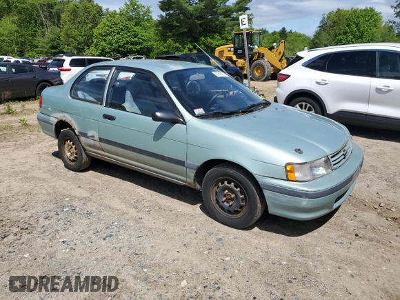 1992 Toyota Tercel z VIN JT2EL43B1N0209927, wystawiony jako Copart lot #57595275 z przebiegiem 87 577 mil mil oraz Tytuł czysty. Historia ofert i sprzedaży dostępna na DreamBid. Obrazek 4.