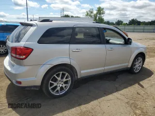2013 Dodge Journey R/T with VIN 3C4PDDFG3DT606514, listed as a Copart auction lot 65601315 with 129,236 mi miles and Clean title. Bid and sale history available at DreamBid. Image 3.