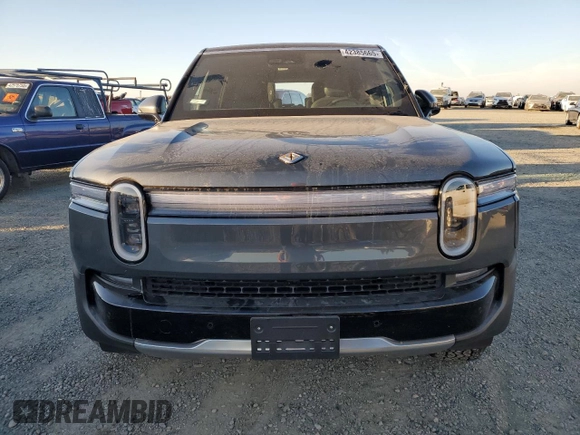 2025 Rivian R1S Adventure with VIN 7PDSGBBA6SN048784, listed as a Copart auction lot 42385665 with Not Provided miles and Salvage Title. Bid and sale history available at carsss.com. Image 5.