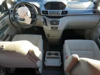 2014 Honda Odyssey LX with VIN 5FNRL5H27EB039999, listed as a Copart auction lot 48950565 with 121,740 mi miles and Salvage Title. Bid and sale history available at carsss.com. Image 8.