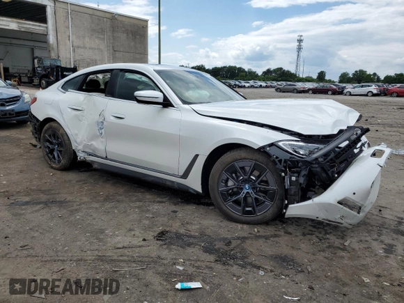 2023 BMW i4 eDrive35 with VIN WBY43AW02PFR38903, listed as a Copart auction lot 58691344 with 5,166 mi miles and Salvage Title. Bid and sale history available at carsss.com. Image 4.